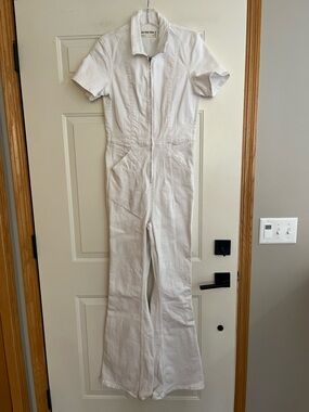Women’s We the free Jayde white fitted stretch denim flared leg jump suit medium